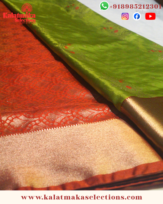 Mehandi Green Color Pattu saree with contrast border and contrast blouse with golden meena work