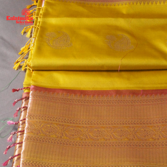 Yellow Uppada Soft Pattu Saree with all over Boota Design and Pink Border with Tussels