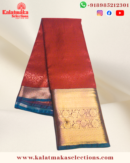 Red Color Kanchi pattu saree with all over golden zari and cooper border with blouse
