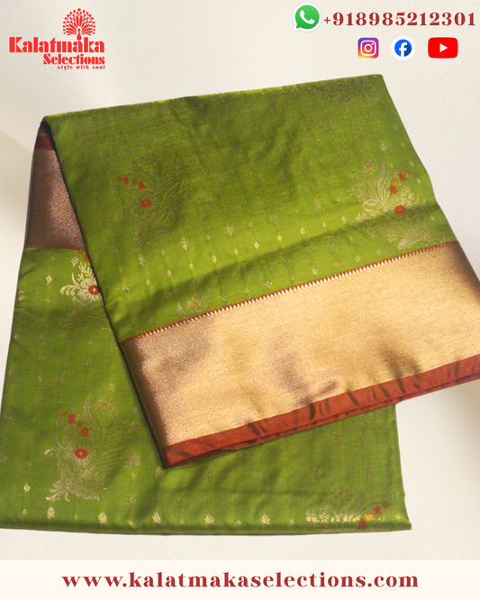 Mehandi Green Color Pattu saree with contrast border and contrast blouse with golden meena work