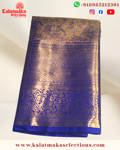 Blue Kanchi padia pattu saree with bridal design and contrast matching border