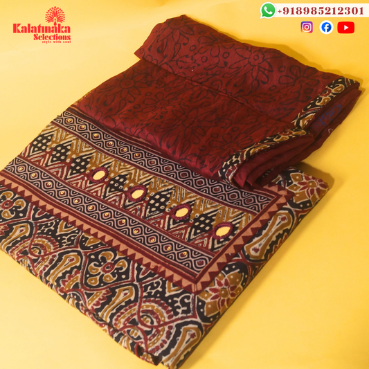 Cream and Black Kalamkari Printed with Mirrors Dress Material with Red Bottom