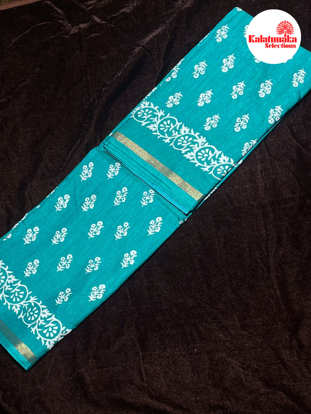 Lightweight Dark Green Tissue Saree with Golden Border