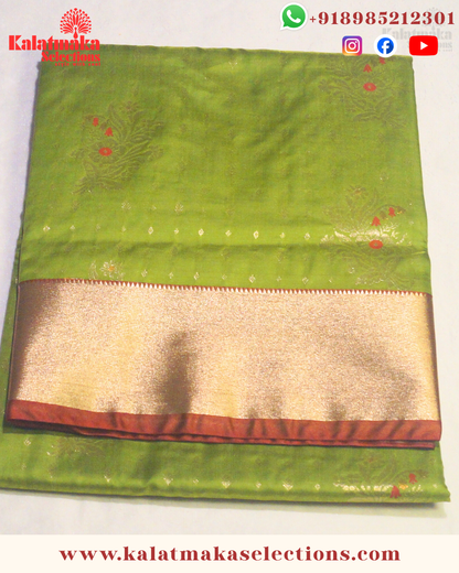 Mehandi Green Color Pattu saree with contrast border and contrast blouse with golden meena work