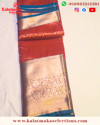 Red Color Kanchi pattu saree with all over golden zari and cooper border with blouse