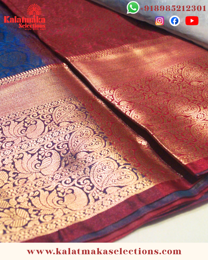 Sea Blue Color Kancipattu saree with all over golden zari and cooper border with blouse