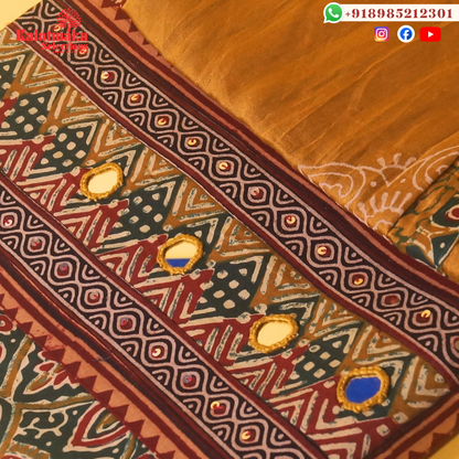 Green and Red Kalamkari Printed Dress Material with Mirrors and Mustard Bottom