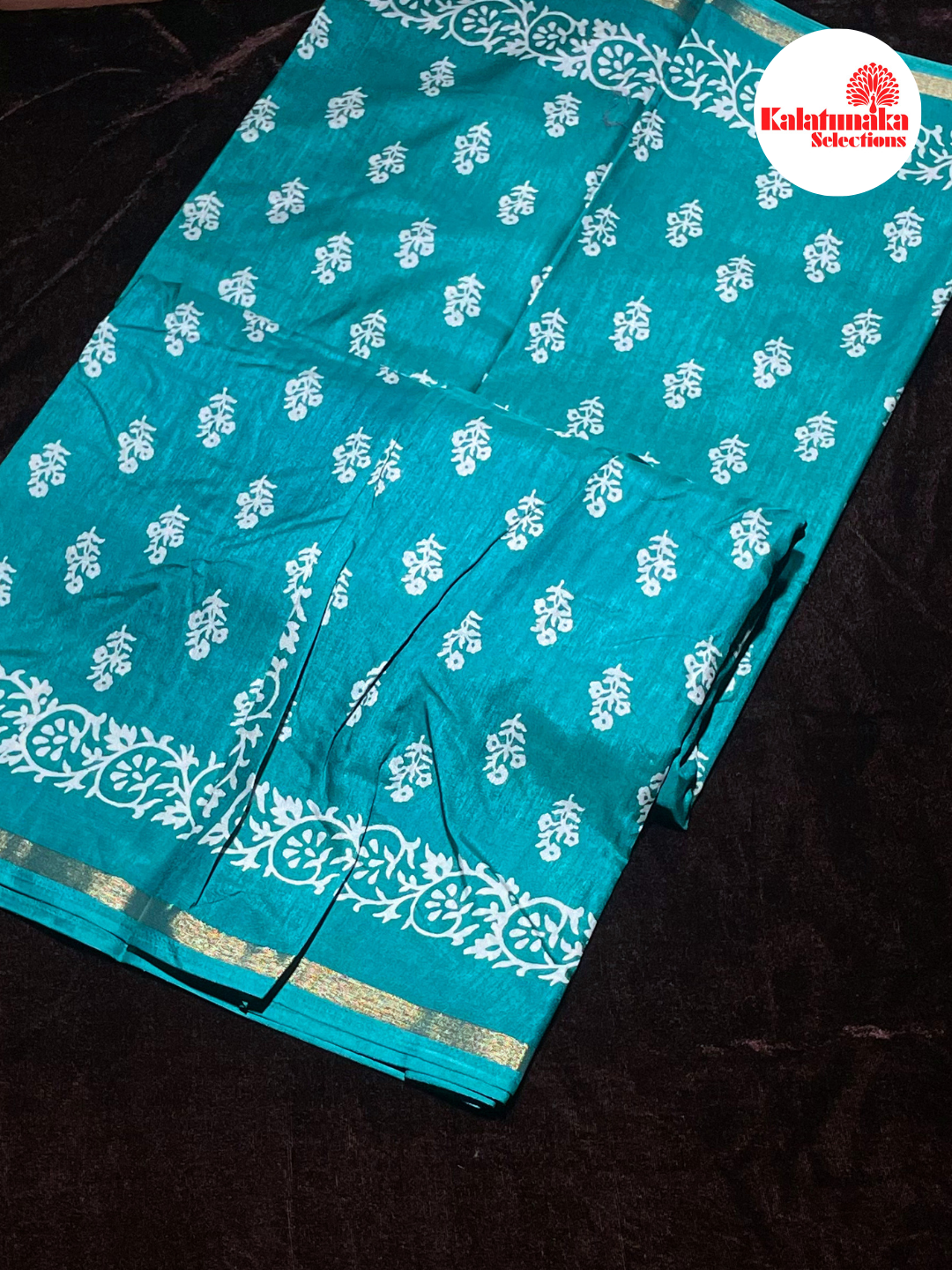 Lightweight Dark Green Tissue Saree with Golden Border