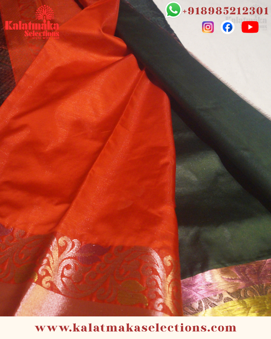 Dark Green Pattu Saree with contrast border with copper butta and copper border with blouse