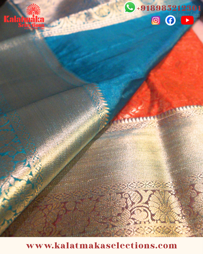 Red Color Kanchi pattu saree with all over golden zari and cooper border with blouse