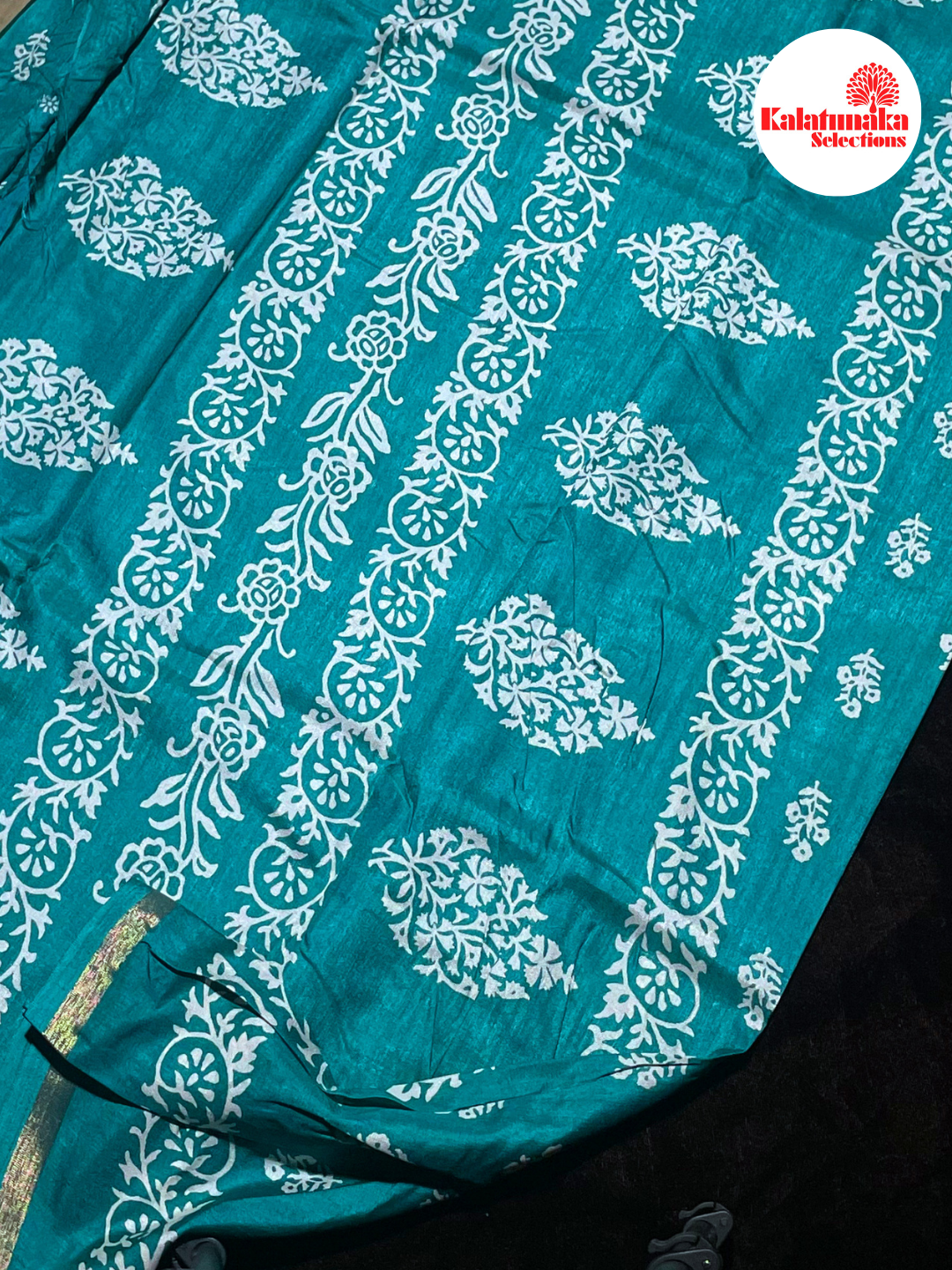 Lightweight Dark Green Tissue Saree with Golden Border