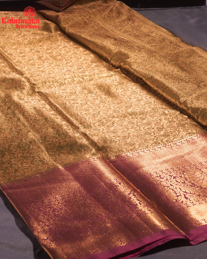 Green with Golden Work and Purple Border Padia Pattu Saree