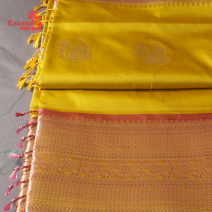 Yellow Uppada Soft Pattu Saree with all over Boota Design and Pink Border with Tussels