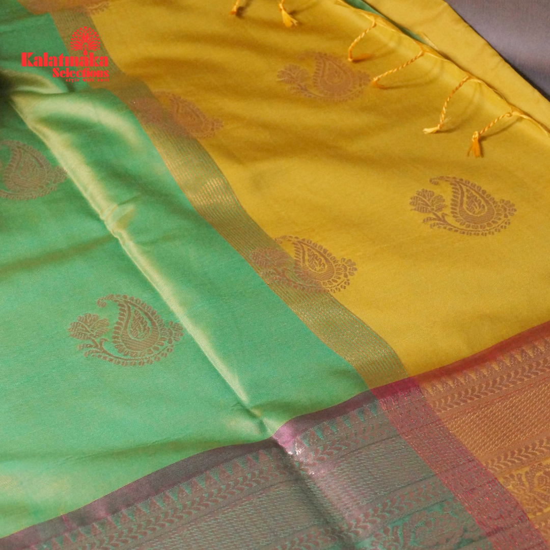 Yellow Uppada Soft Pattu Saree with all over Boota Design and Pink Border with Tussels